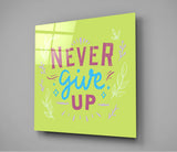 “Never Give Up” Glass Wall Art