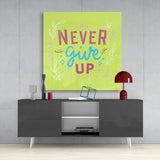 “Never Give Up” Glass Wall Art