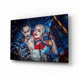 Harley Quinn und der Joker Glasbild